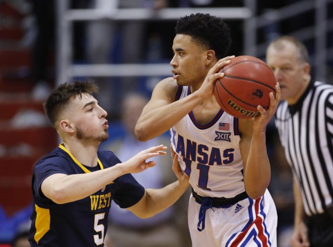 No. 14 Kansas Routs WVU